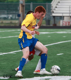 Thomas battling for possession in Michigan