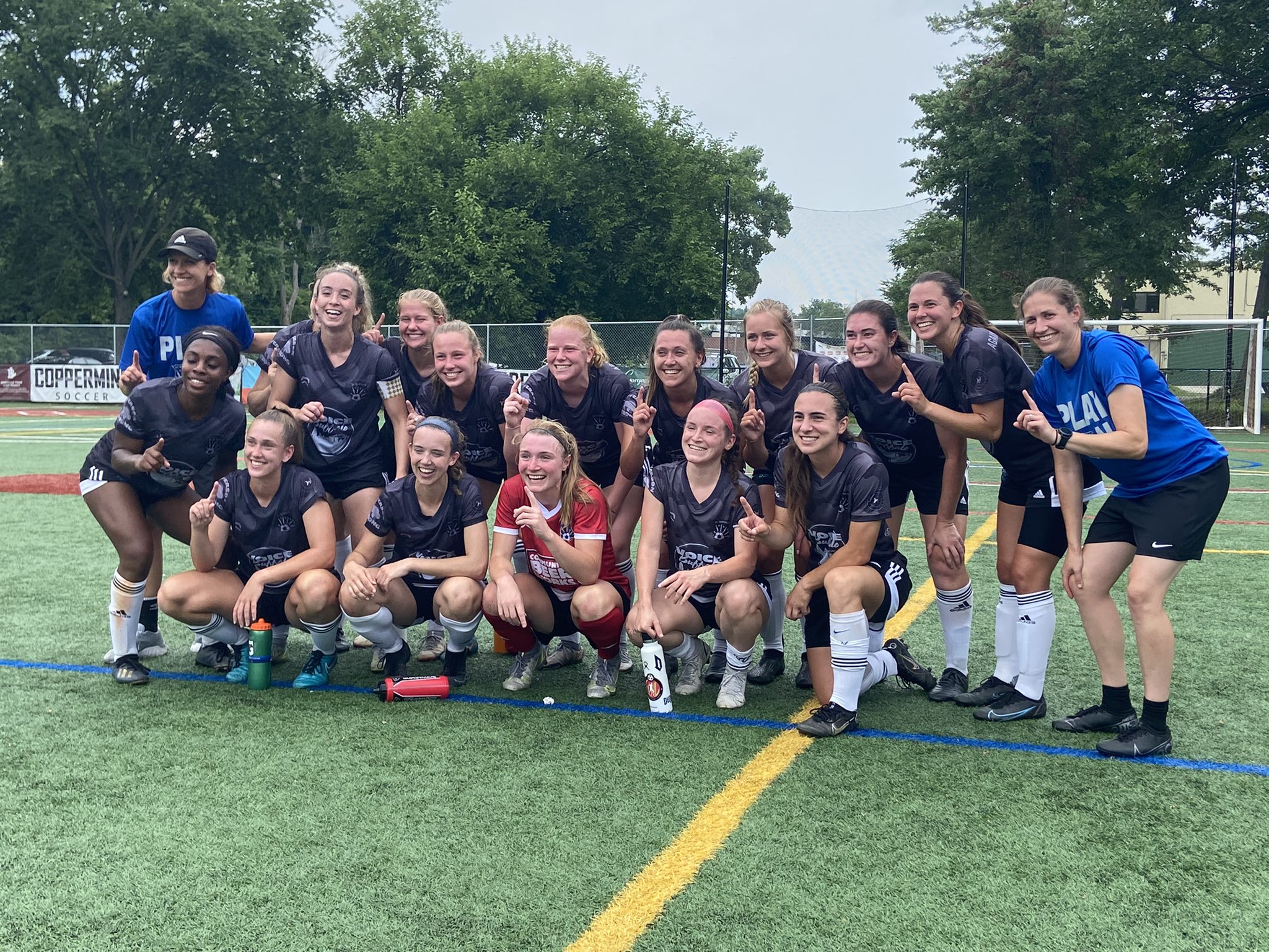 FC Buffalo lines up for a team photo before Sunday's 3-2 win over Coppermine United